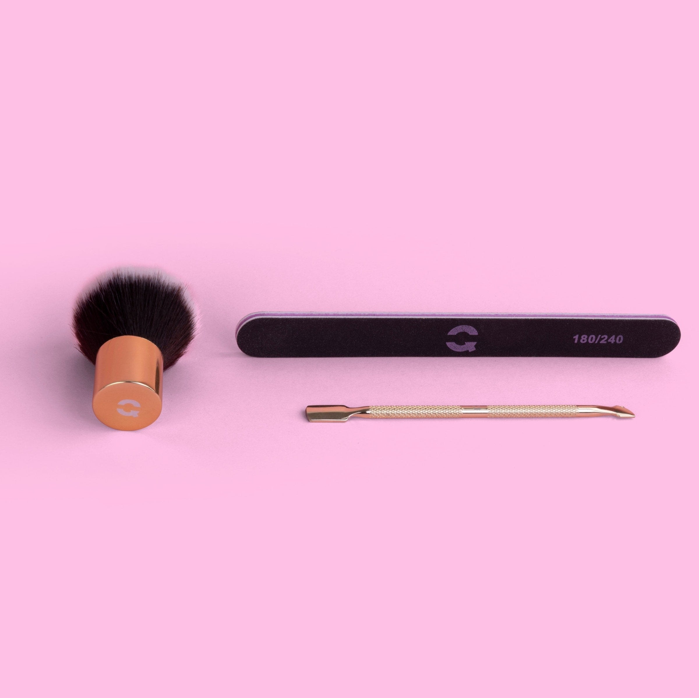 powder brush, nail file and cuticle pusher